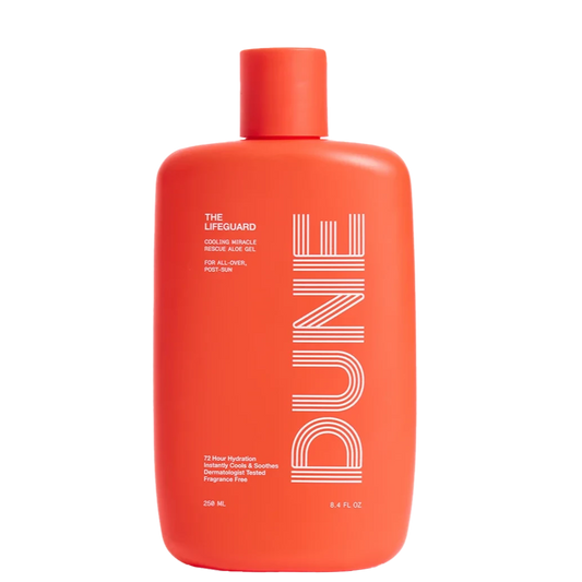 A red bottle of Dune Suncare The Lifeguard aloe gel with white and silver text detailing the product name and benefits.